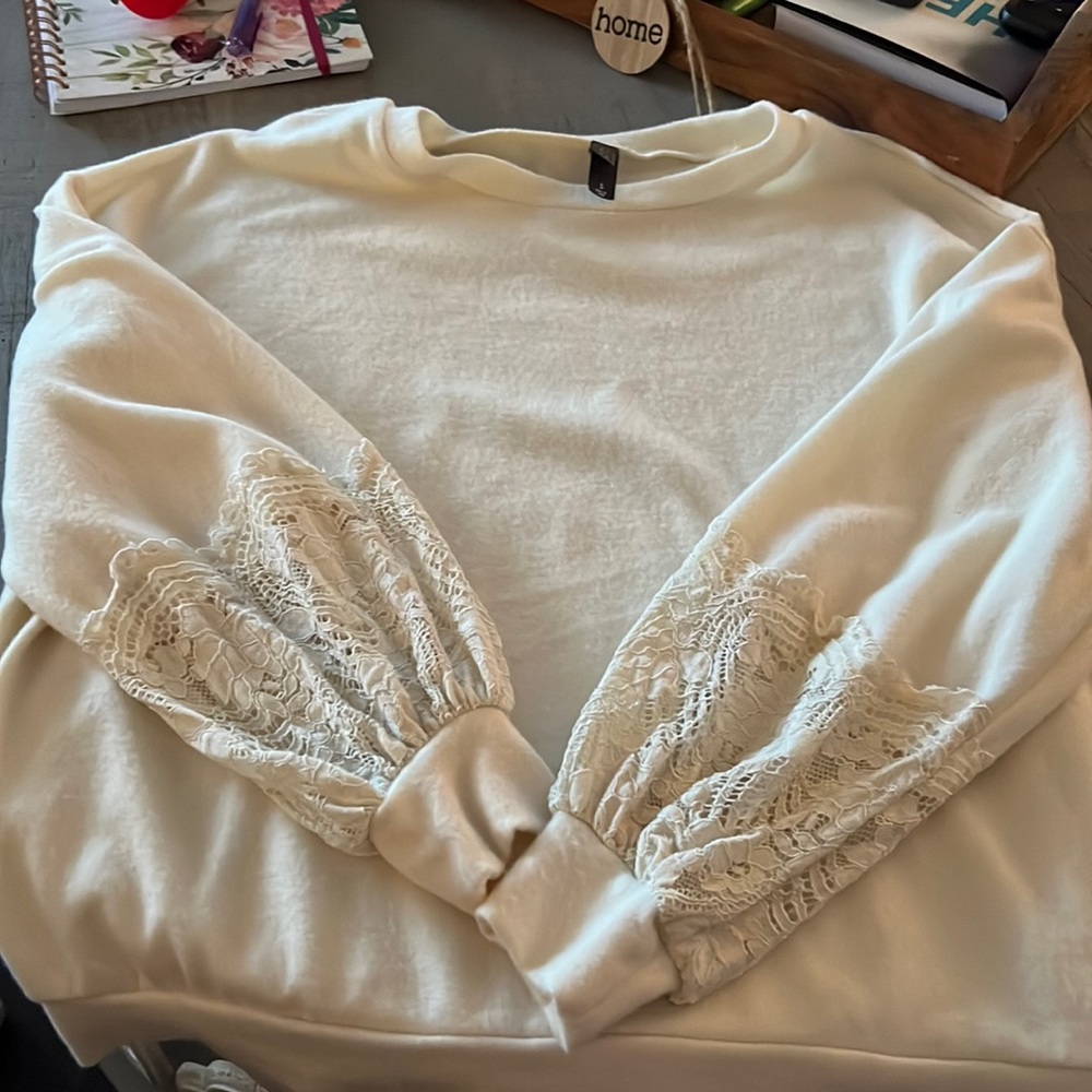 So cute! off white size small sweatshirt sweater with lace sleeves! brand new!